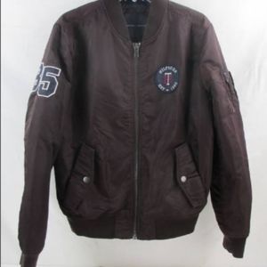 Tommy Hilfiger jacket. Size small but kind of runs like a medium. Color is brown